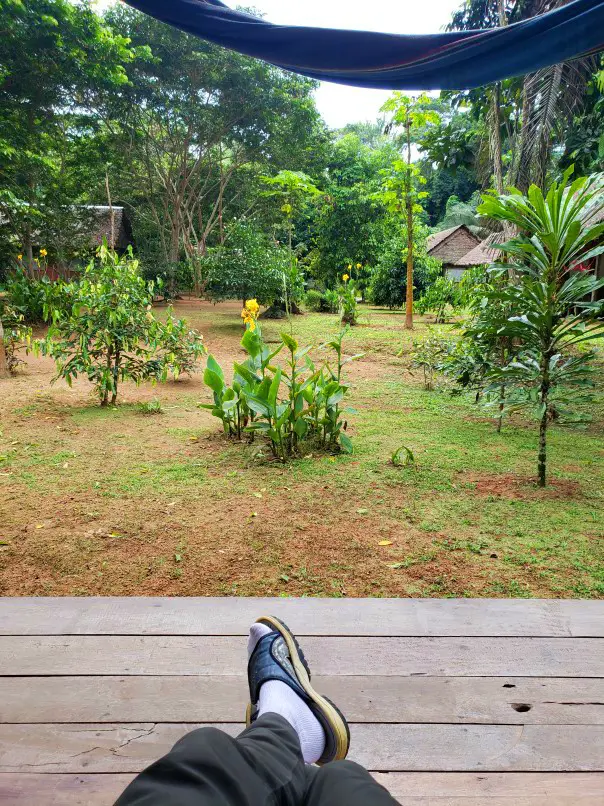 relaxing with feet up at the Amazon Lodge in Bolivia