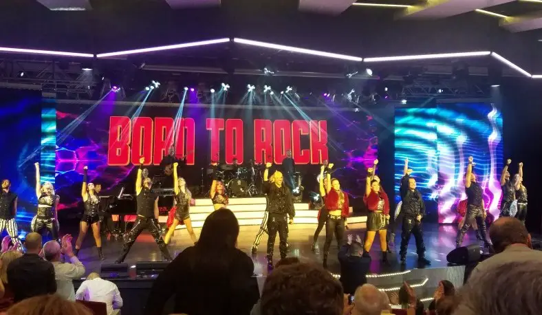 BORN TO ROCK with dancers on stage for show on MSC cruise