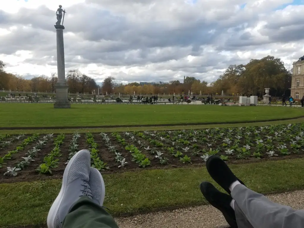 Relaxing on the green chairs in Luxembourg Gardens