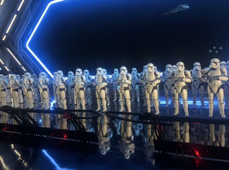 Stormtroopers lining the walkway of the Star Destroyer in Rise of the Resistance ride at Star Wars Galaxy's Edge
