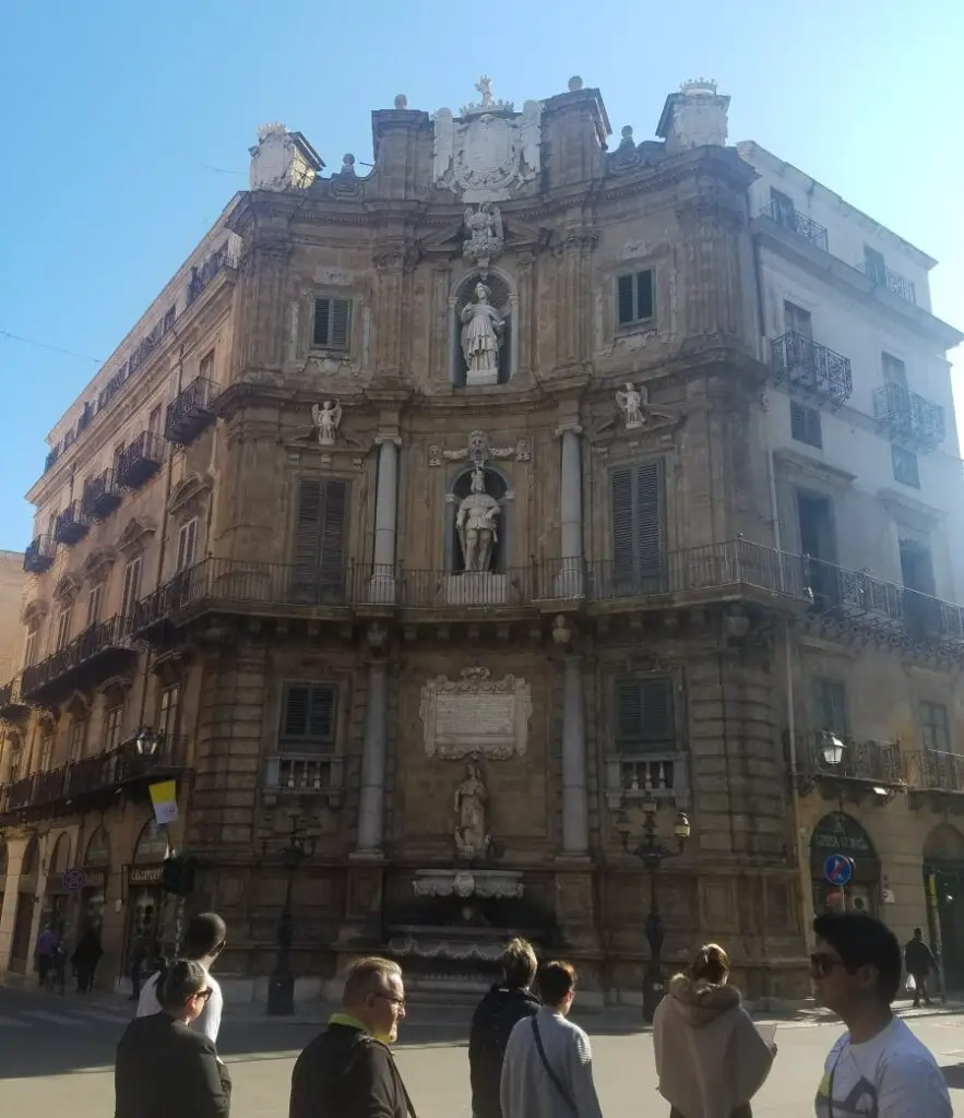 large building with sculptures on it Quatro Canti on a one day tour in Palermo