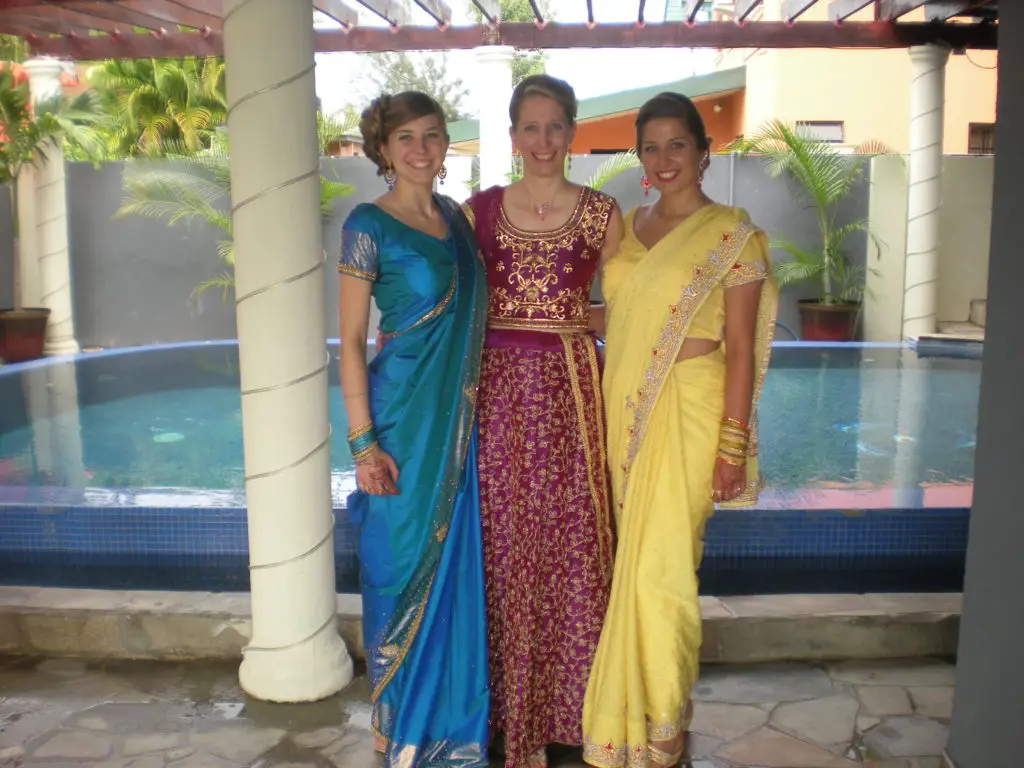 michelle and daughters dressed for hindu wedding in trinidad