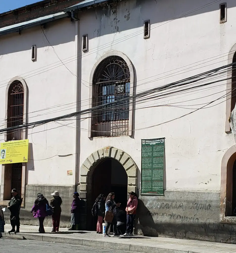 people gathered at prison entrance