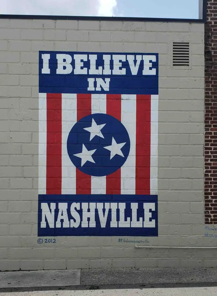 Brick wall featuring I believe in Nashville street art sign: one of the most popular murals in Nashville Tennessee