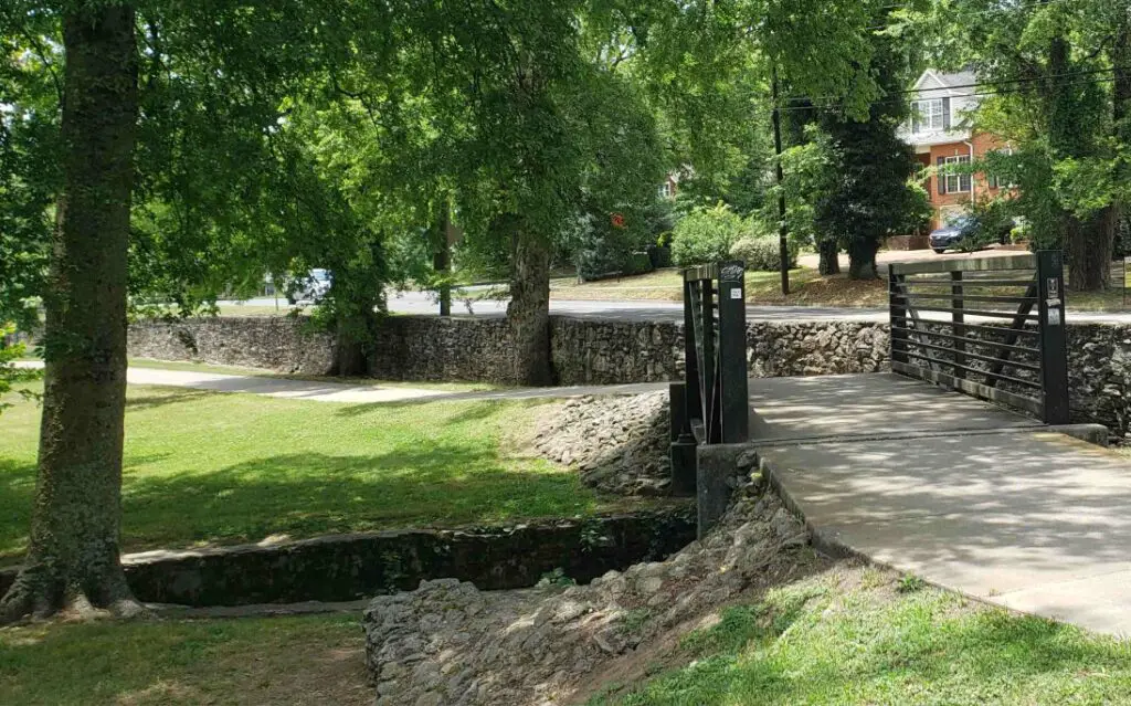 walking path surrounded by tree in a park near 12 South in nashville