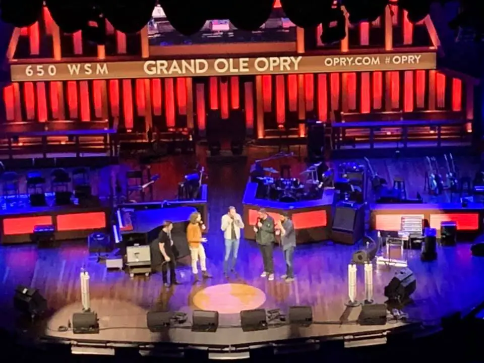 performers on stage at the Grand Ole Opry in Nashville