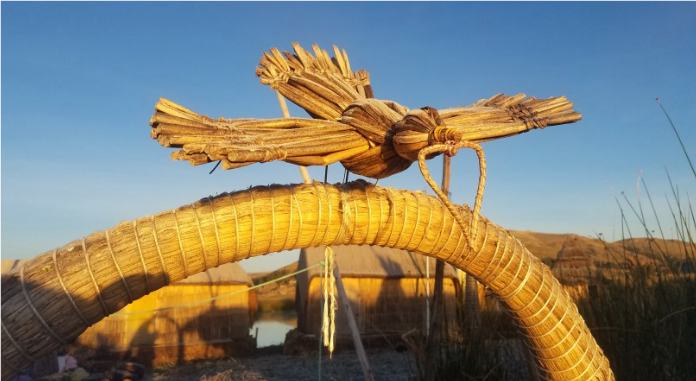 bird made of reeds decorating a boat on lake titicaca in peru