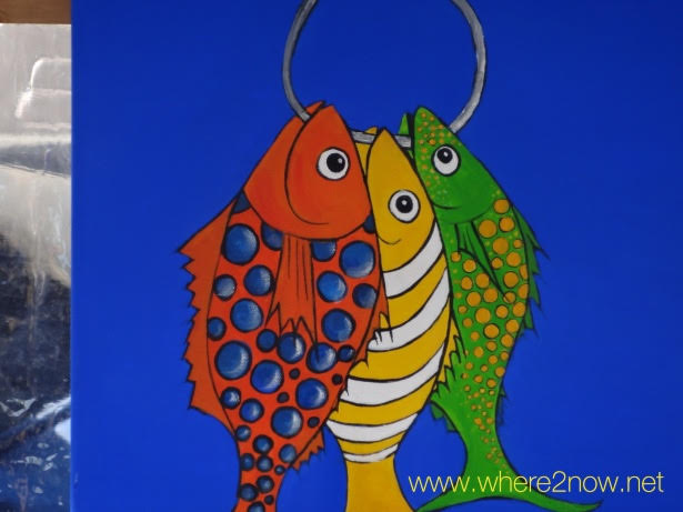 three fish on a hook