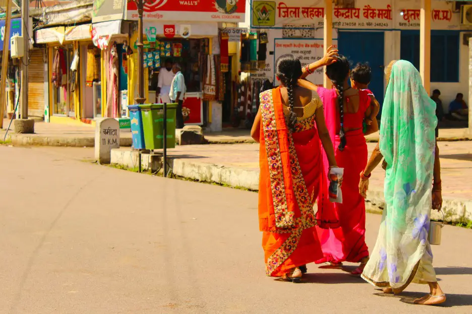 women walking at Indian Market street