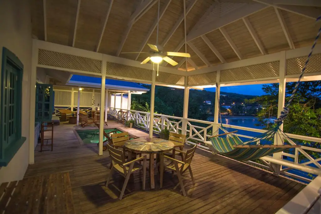 outside balcony and sitting area at Licorish by the sea - balcony- Guest houses in Tobago