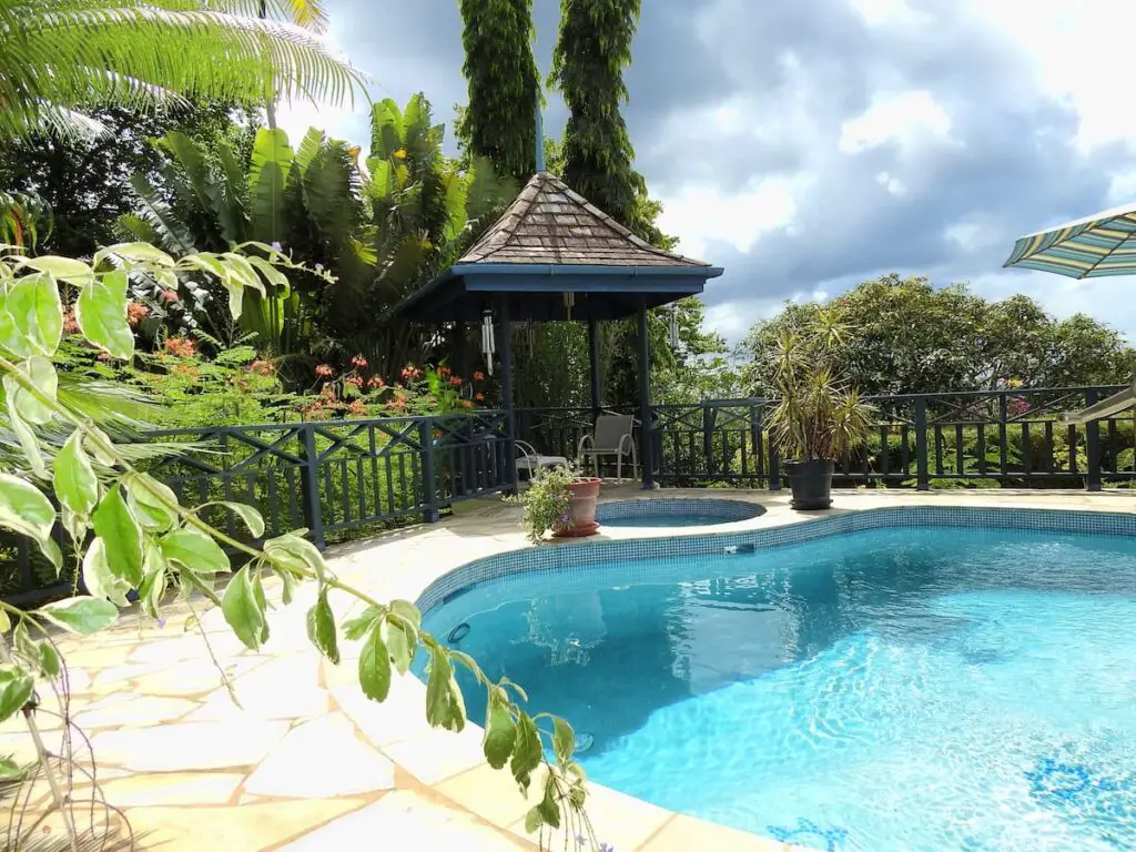 pool and gardens at Mock Turtle Bungalow - guest house in Tobago with pool