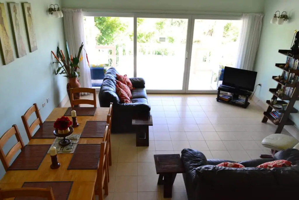 couch and sliding doors at Modern Villa in Tobago - sitting room