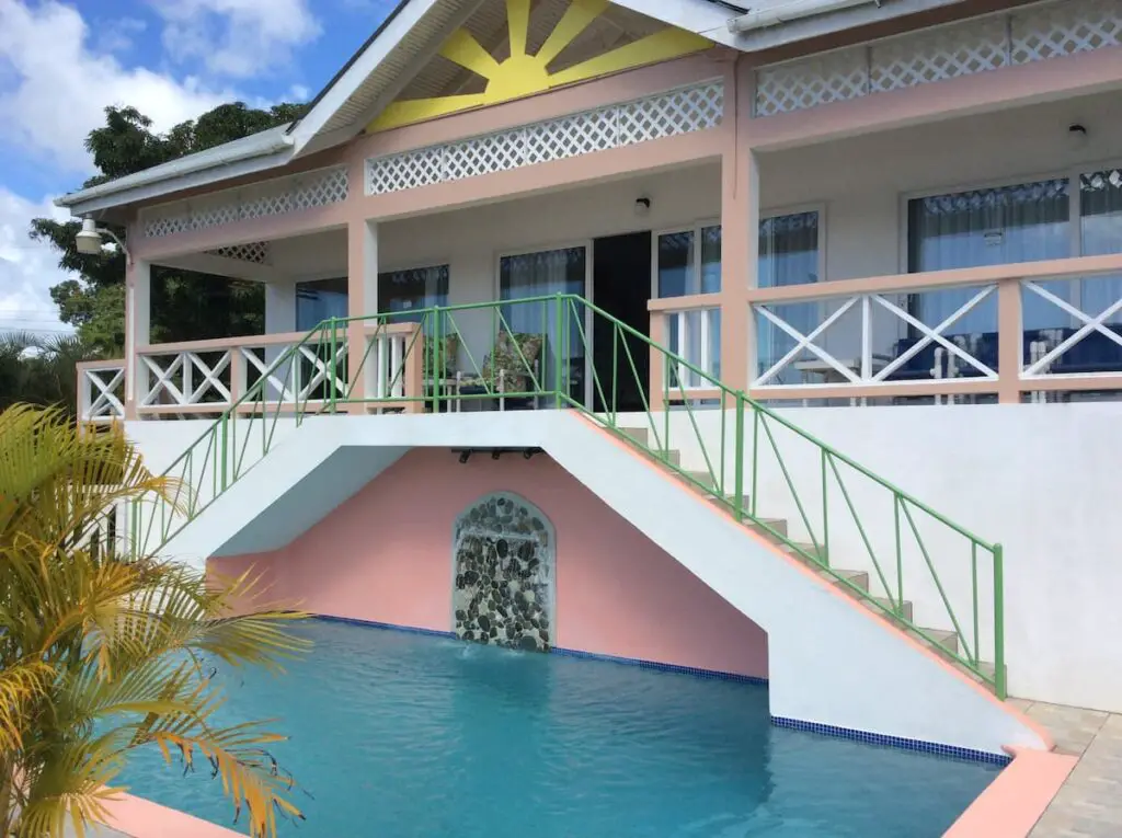 pool and entrance to guest house at Modern Villa to rent in Tobago