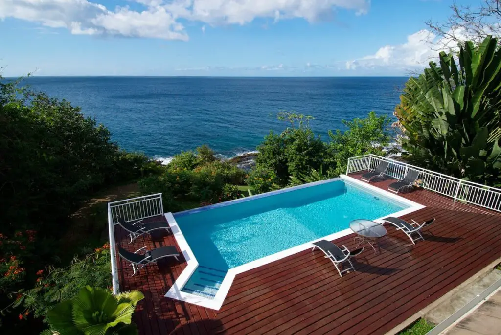 pool overlooking the sea at Mot Mot Luxury Lodge- guest houses in Tobago