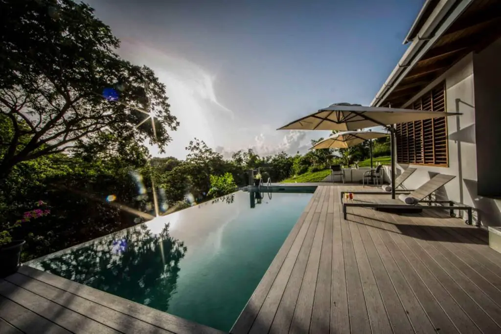 pool and greenery at firefly treetop villa-pool-apartment in Tobago with pool