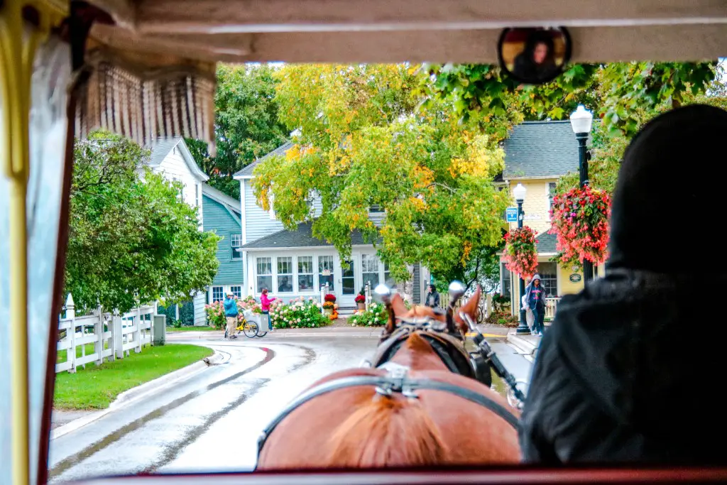 horse-drawn carriage on mackinac island for a grown-up getaway in the US