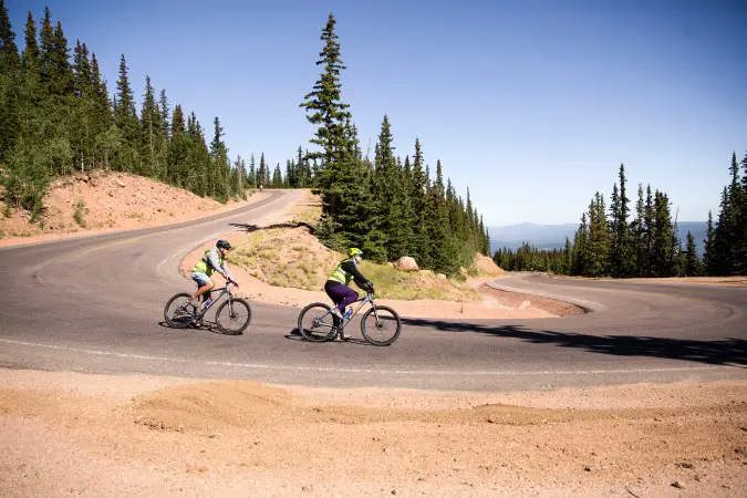 Bikers riding down Pikes Peak Mountain