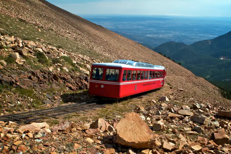 Cog Railway train going up the Pikes Peak Mountain