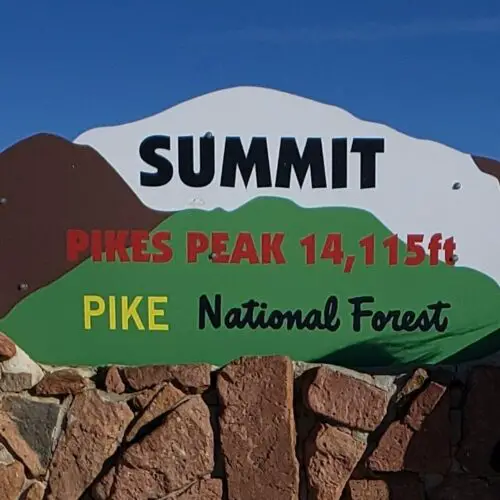 Sign at the summit after driving pikes peak