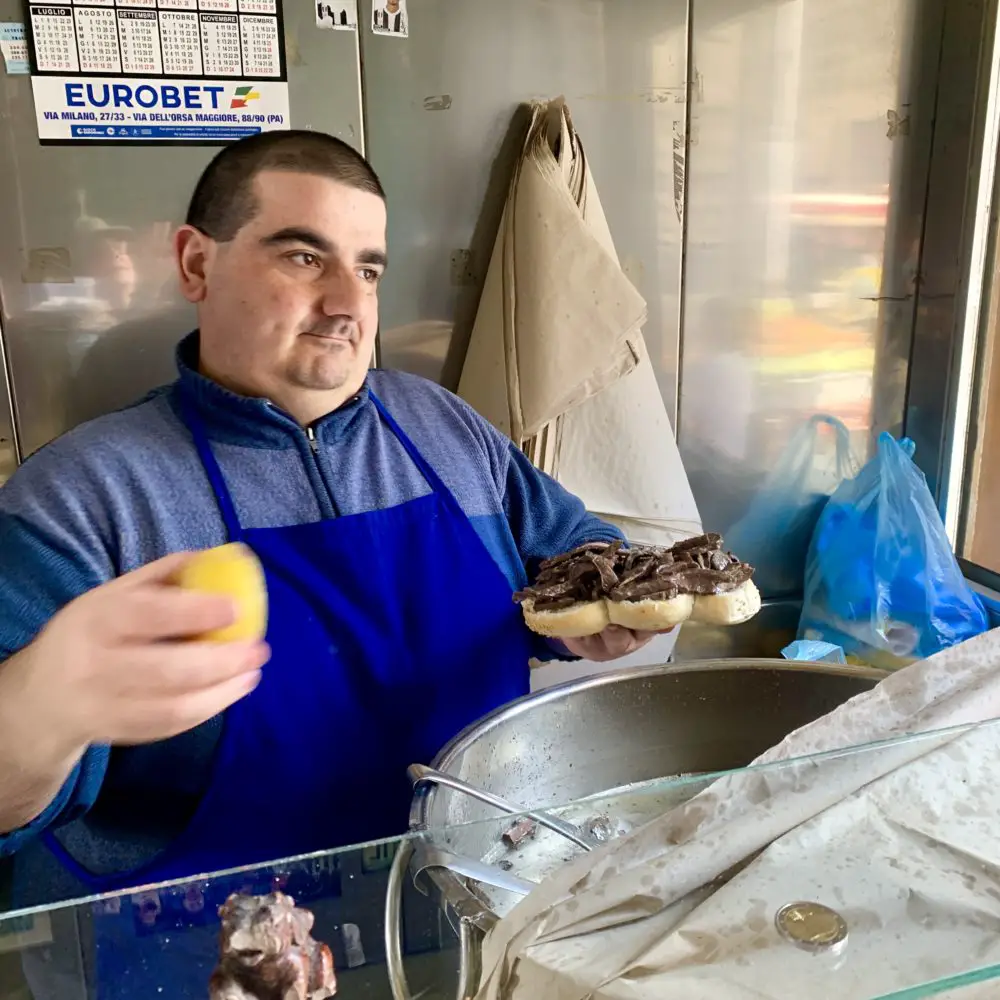 man with Spleen sandwich at Palermo street market