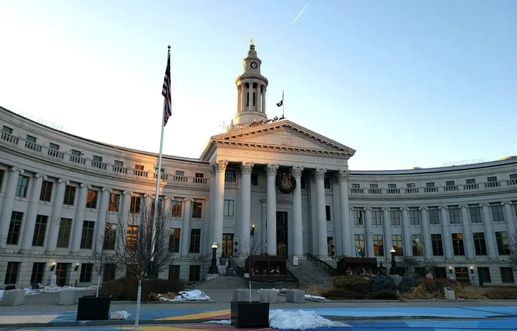 large historic builidng with pillars seen during 24 hours in Denver