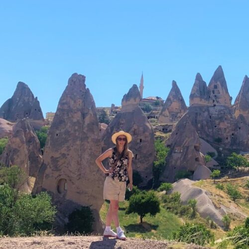 standing in front of amazing formations in Cappadocia Turkey on a 2 day itinerary