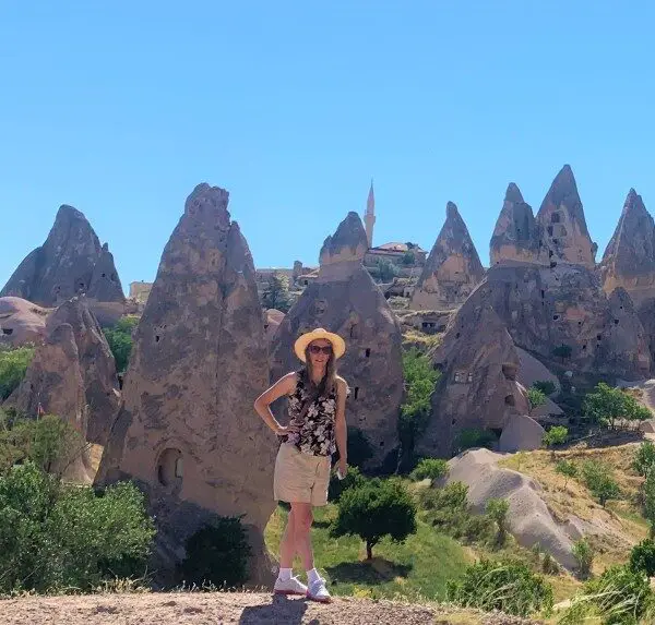 standing in front of amazing formations in Cappadocia Turkey on a 2 day itinerary