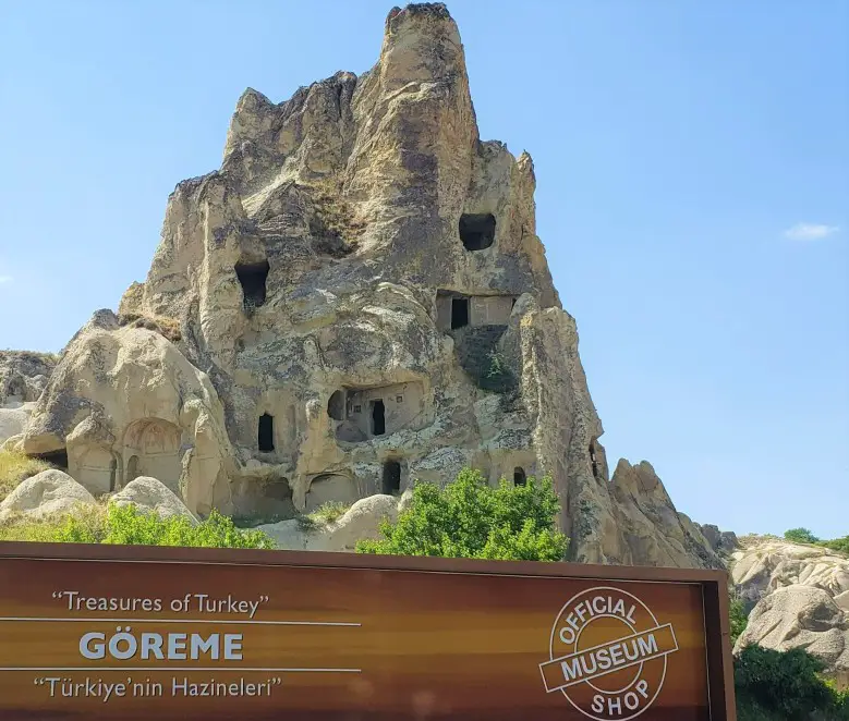 large rock dwelling at entrance of Goreme Museum on a two-day trip in Cappadocia