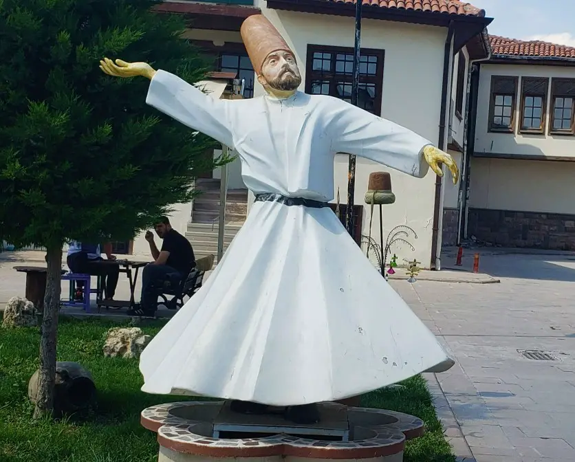 Statue of a Whirling Dervish in white skirt in Turkey