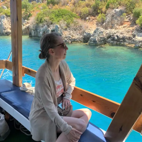 watching the landscape during sunken city boat tour in turkey