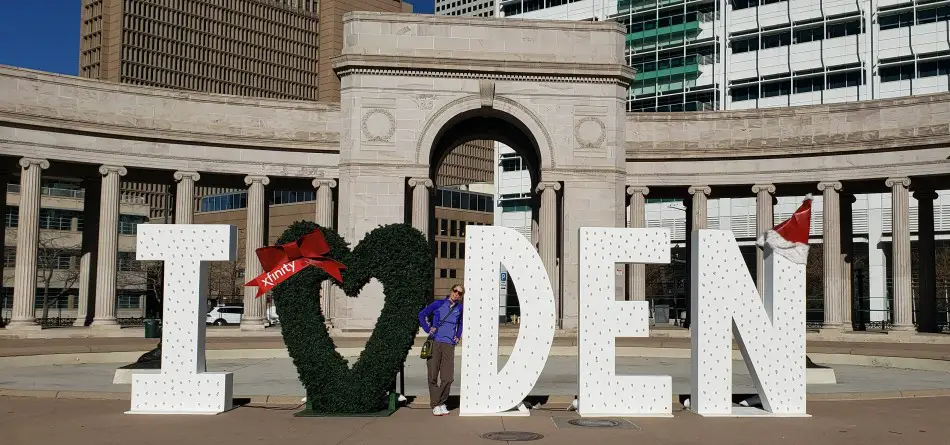 Standing by the I Heart Denver sign - winter activity in Denver