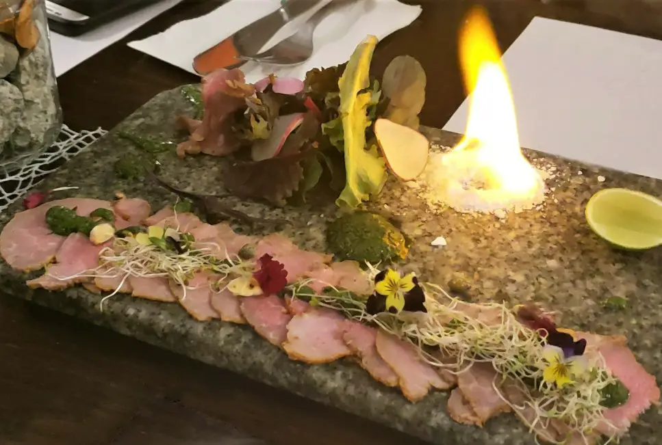 Alpaca meat and Flames for Best Peruvian Dishes at Incontri del Pueblo Viejo in Aguas Calientes Peru