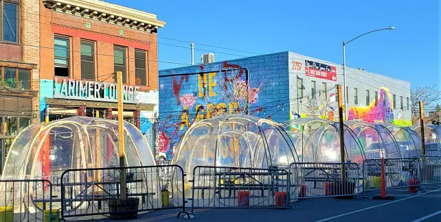 Bubble Dome in front of buildings on the street - Where to eat in Denver Colorado