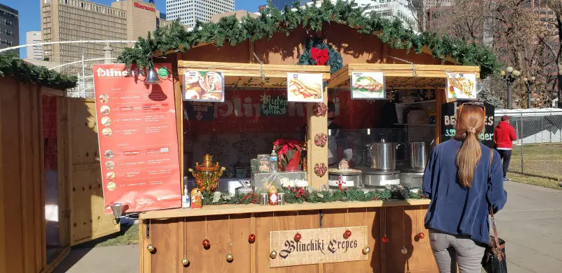 Vendor at the Christkindlmarket in Denver in winter