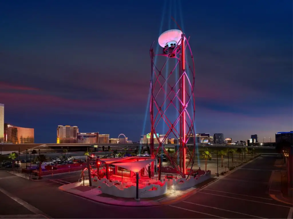 neon balloon ride into the night sky at area15 in Las Vegas