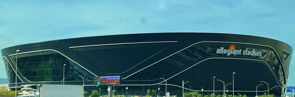 Allegiant Stadium in Las Vegas in front of a blue sky