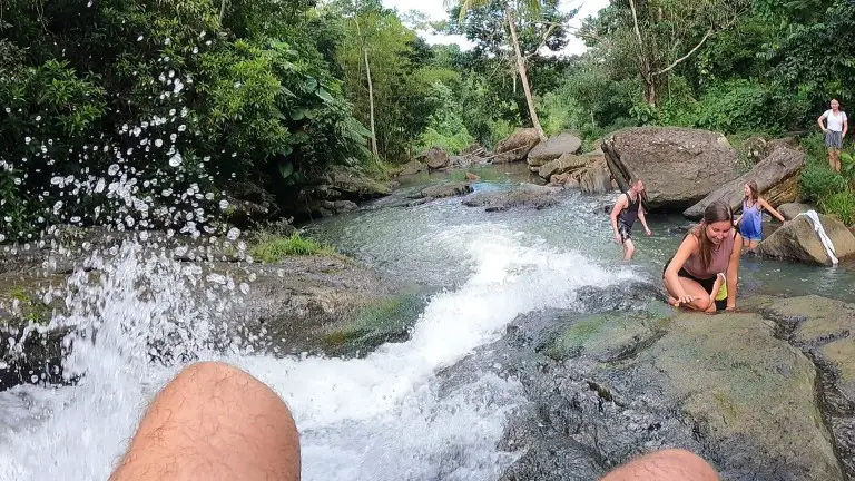 view from top of waterfall while enjoying the natural slide in Puerto Rico