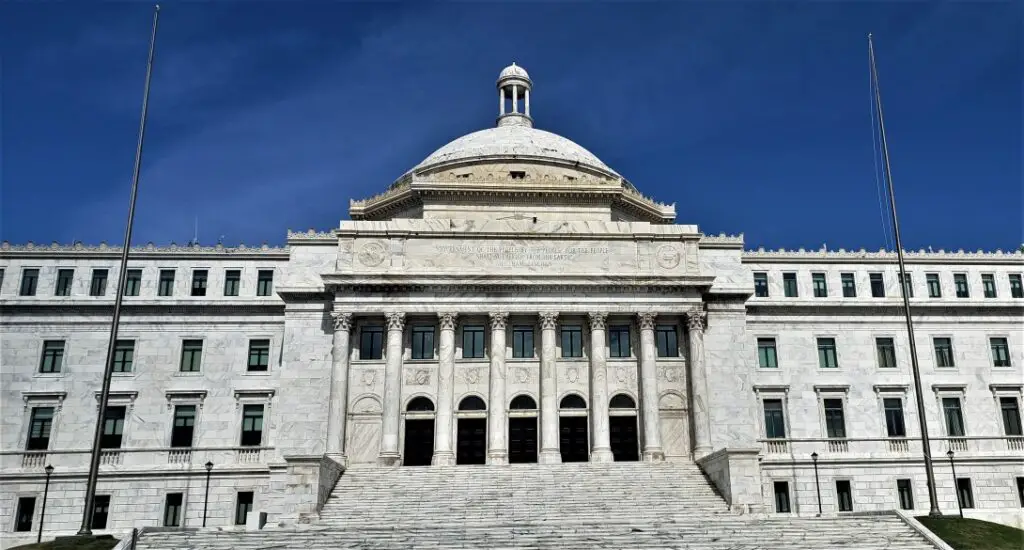 large white building with dome on the top is El Capitalio in old san juan puerto rico