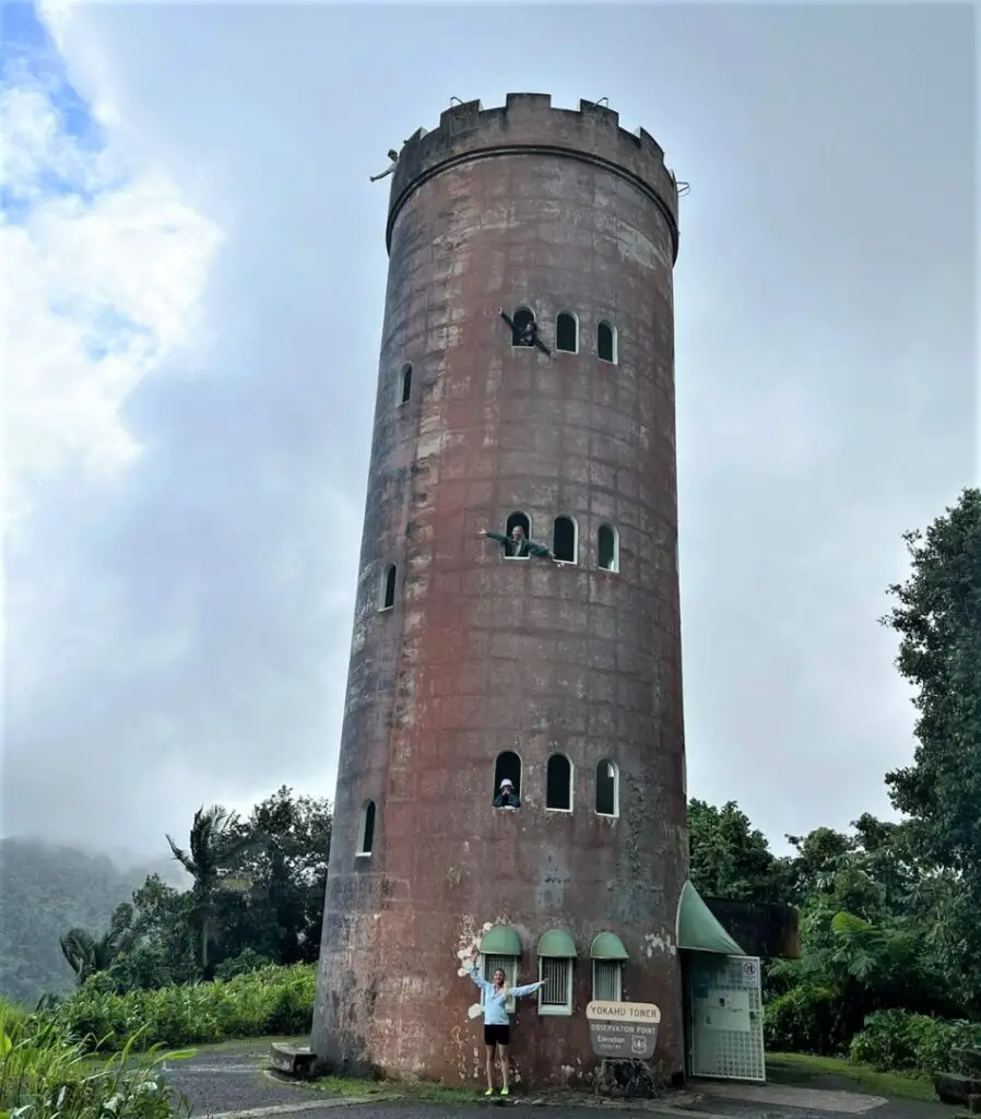 people looking out of the window in Taking the perfect family photo at Yokahu Tower while visiting El Yunque National Forest on our own
