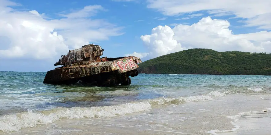 military tank in the blue water on a beach at Flamenco Beach in Culebra in Puerto Rico
