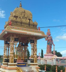 tall statue and golden deities Lord Hanuman - tallest statue in the Caribbean and located in South Trinidad