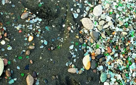 rocks, sand and Sea Glass on the beach of St Kitts