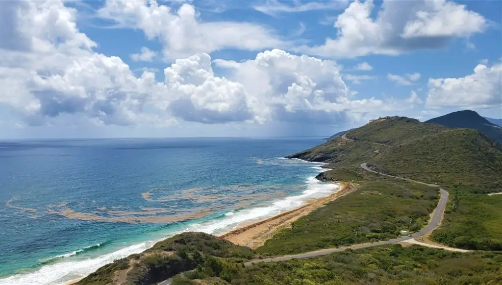view of beach from high up on Timothy Hill in St Kitts in the Caribbean