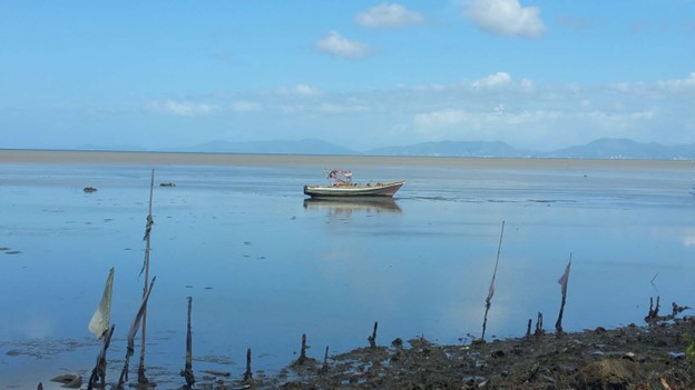boat in the blue water on bay in Carapichaima in South Trinidad