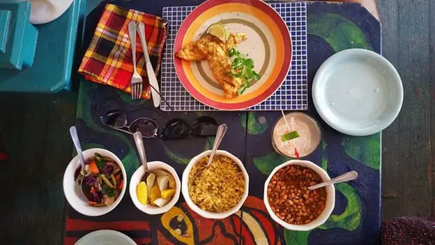 bowls of food on a table for dinner in Trinidad