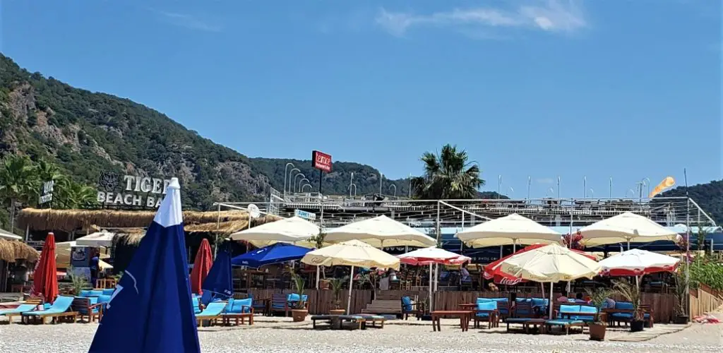 umbrellas and beach chairs in front of the Beach Bars at Oludeniz Beach near Fethiye