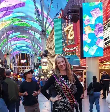 Posing on the busy Fremont Street in Las Vegas during 50th birthday party