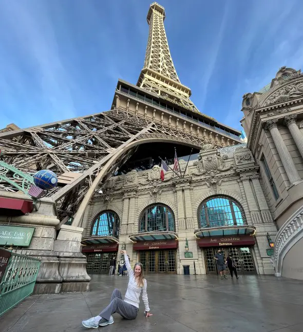 sitting in front of the Eiffel Tower in Las Vegas