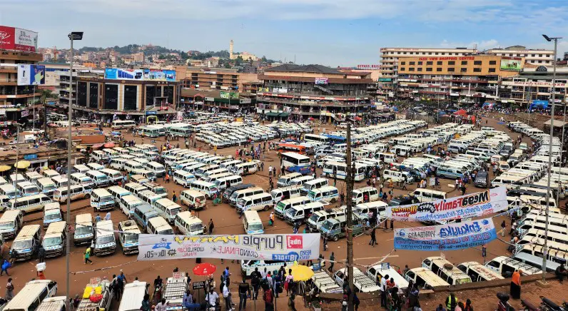 large parking lot in Kampala city full of taxis parkedclose together