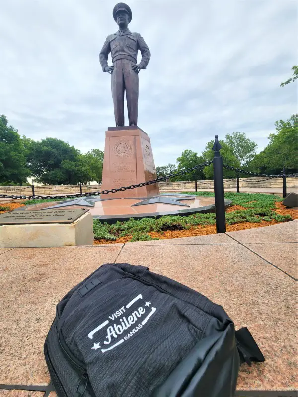 eisenhower statue and abilen kansas backpack in front of it